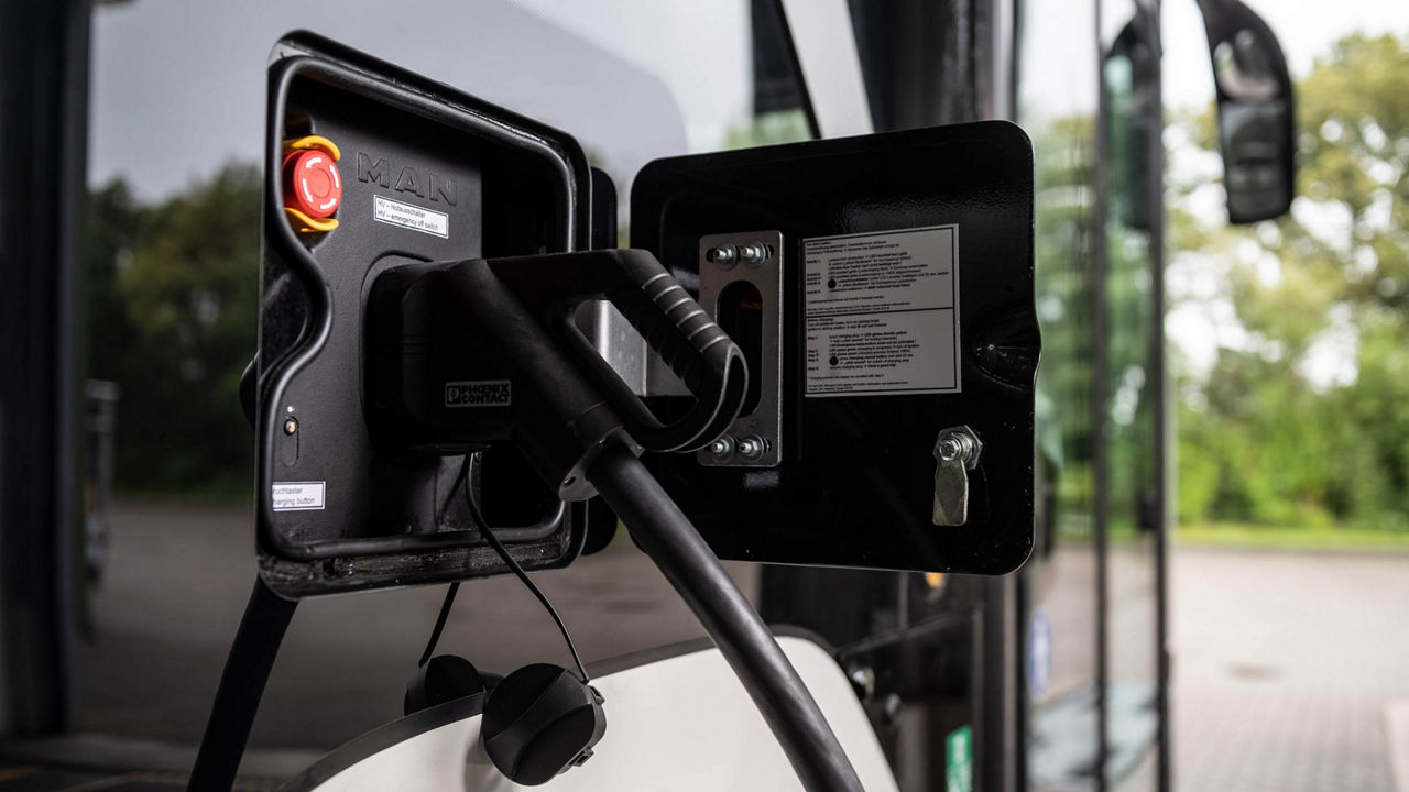 The place to insert the charging cable into the bus