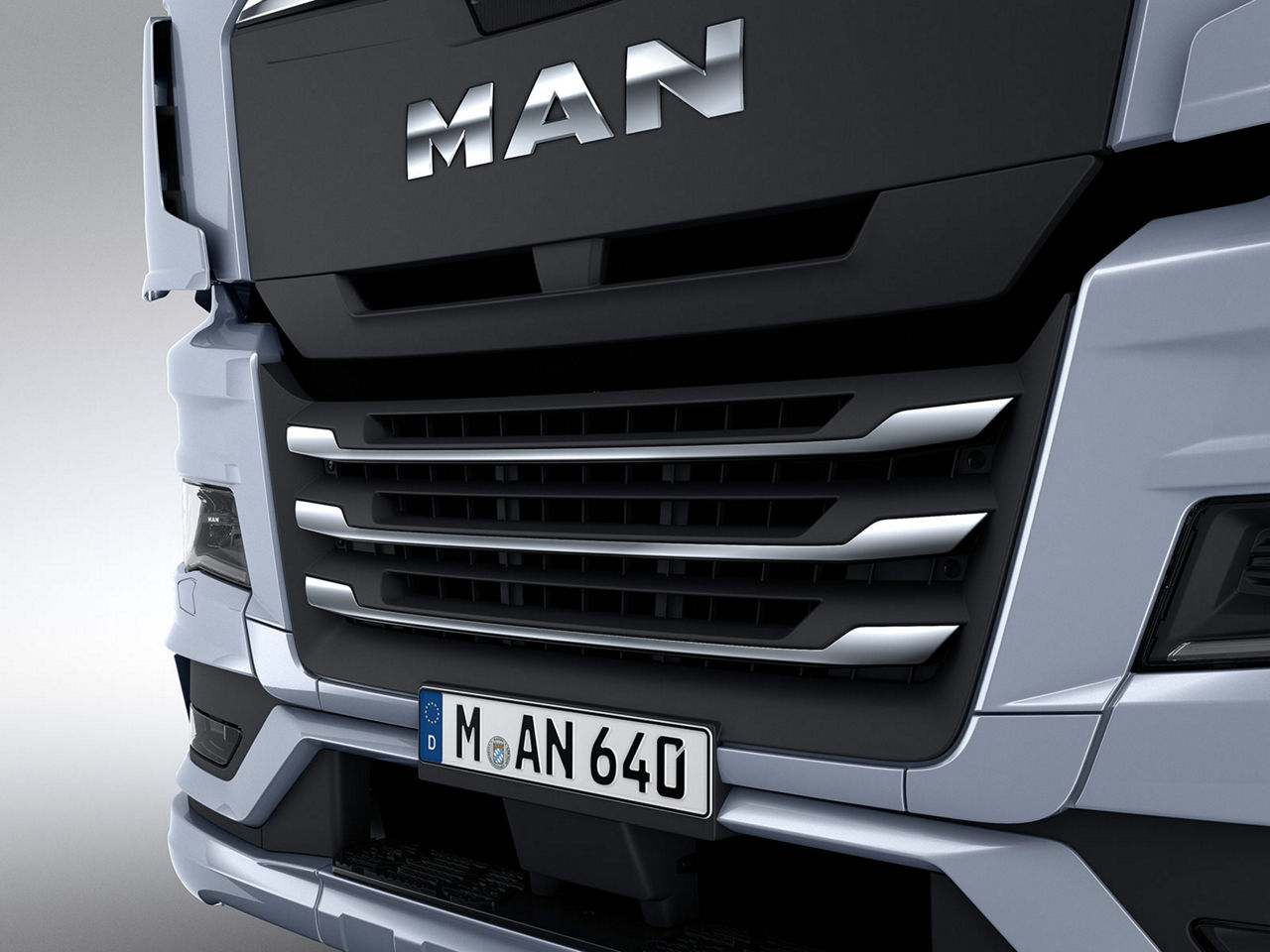Chrome application on the radiator grille of a MAN Truck
