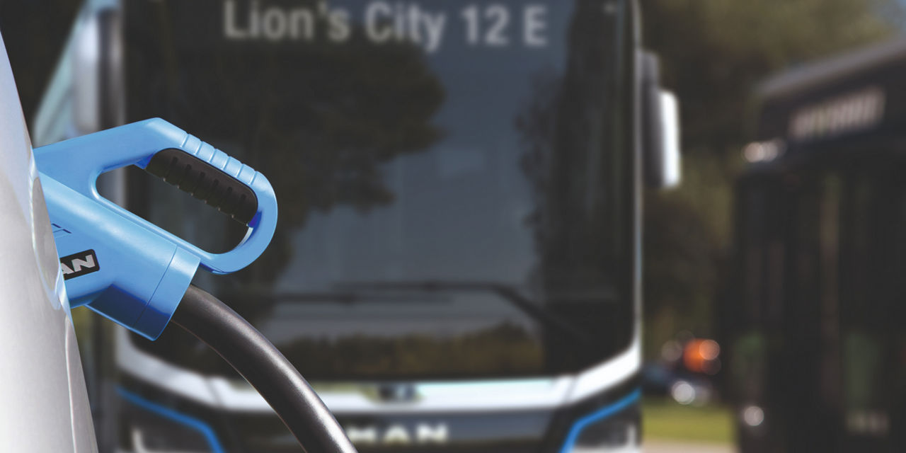 A MAN bus charges up with electricity