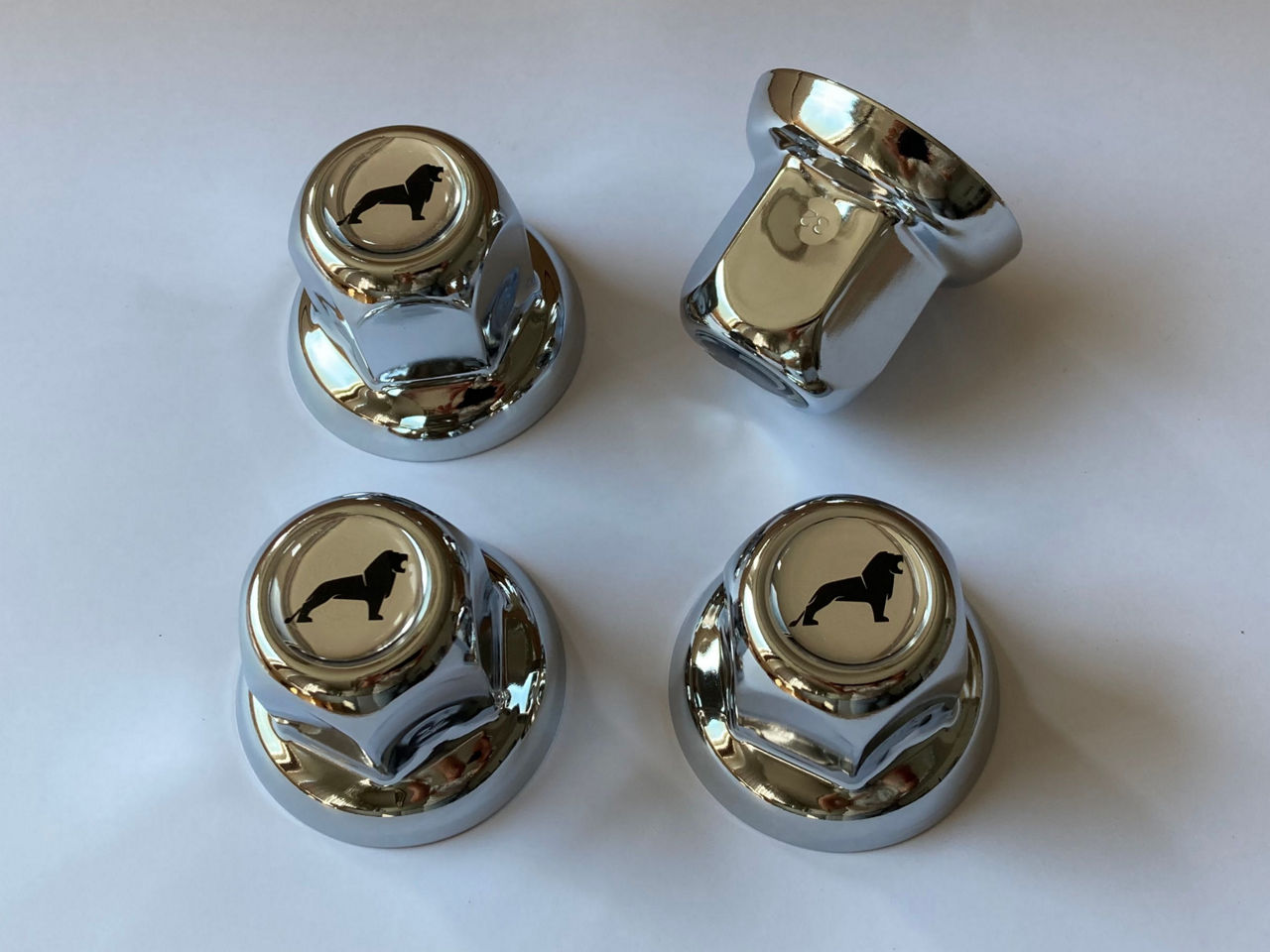 Wielmoerbeschermkappen met leeuw