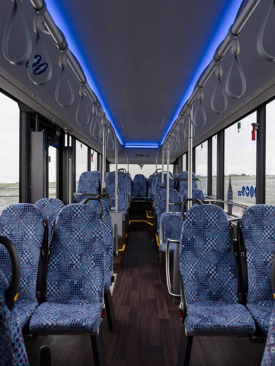 The seats on the bus are blue