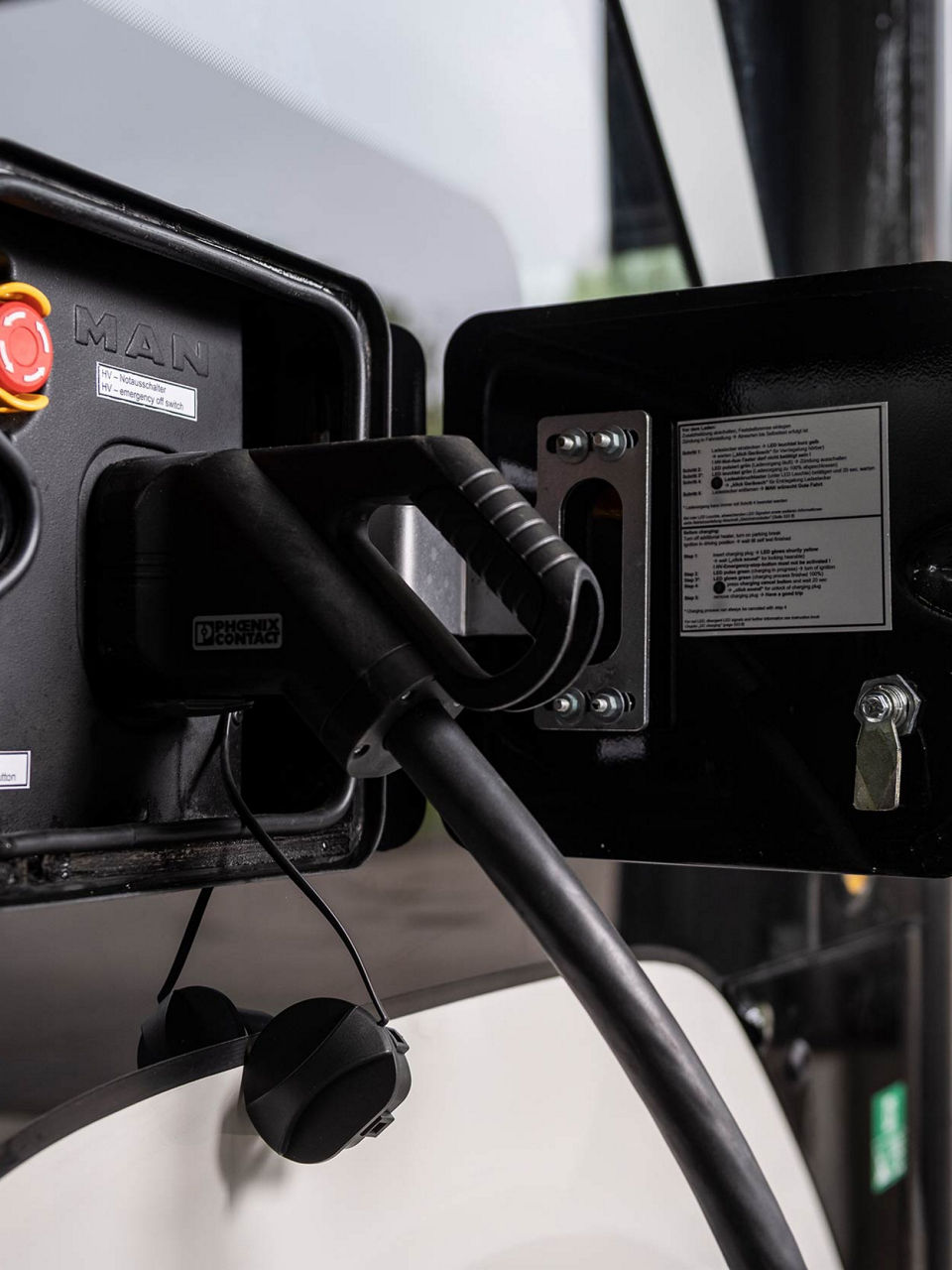 The place to insert the charging cable into the bus