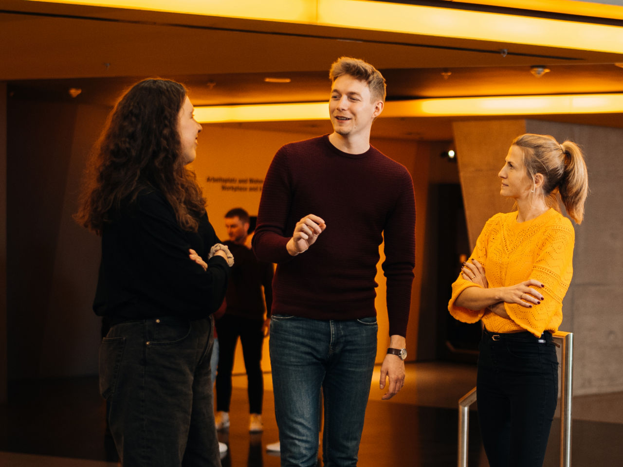 A group of people is in a converation