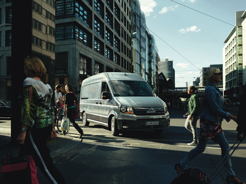 MAN TGE driving in urban setting