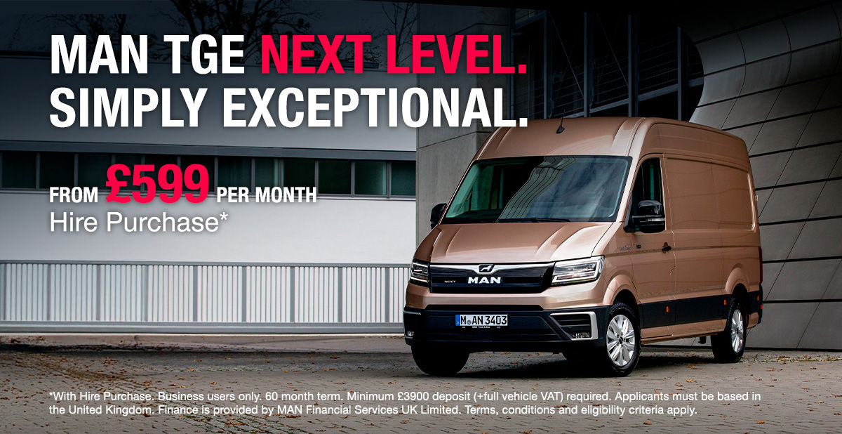 An MAN vans parked in front of a building. T&Cs written beside it.