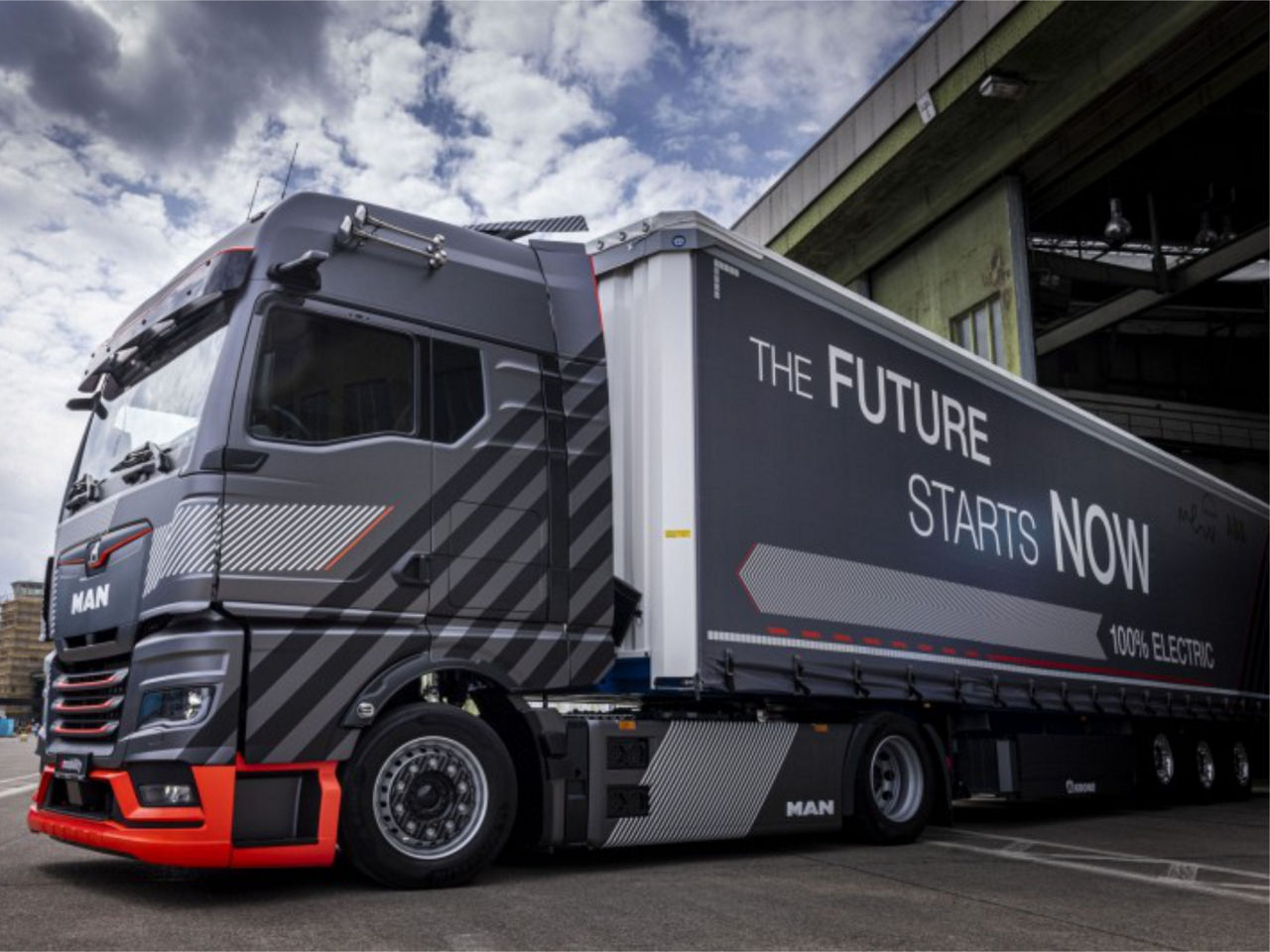 MAN eTruck with “The future starts now” print on loading area
