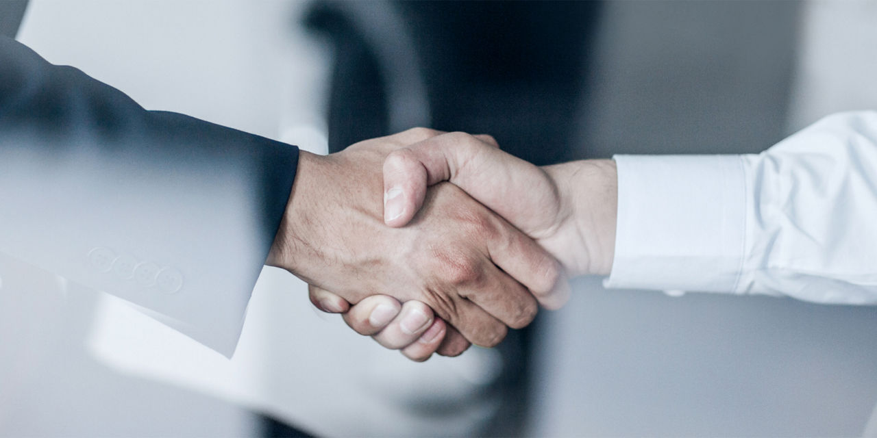 Two people shaking hands