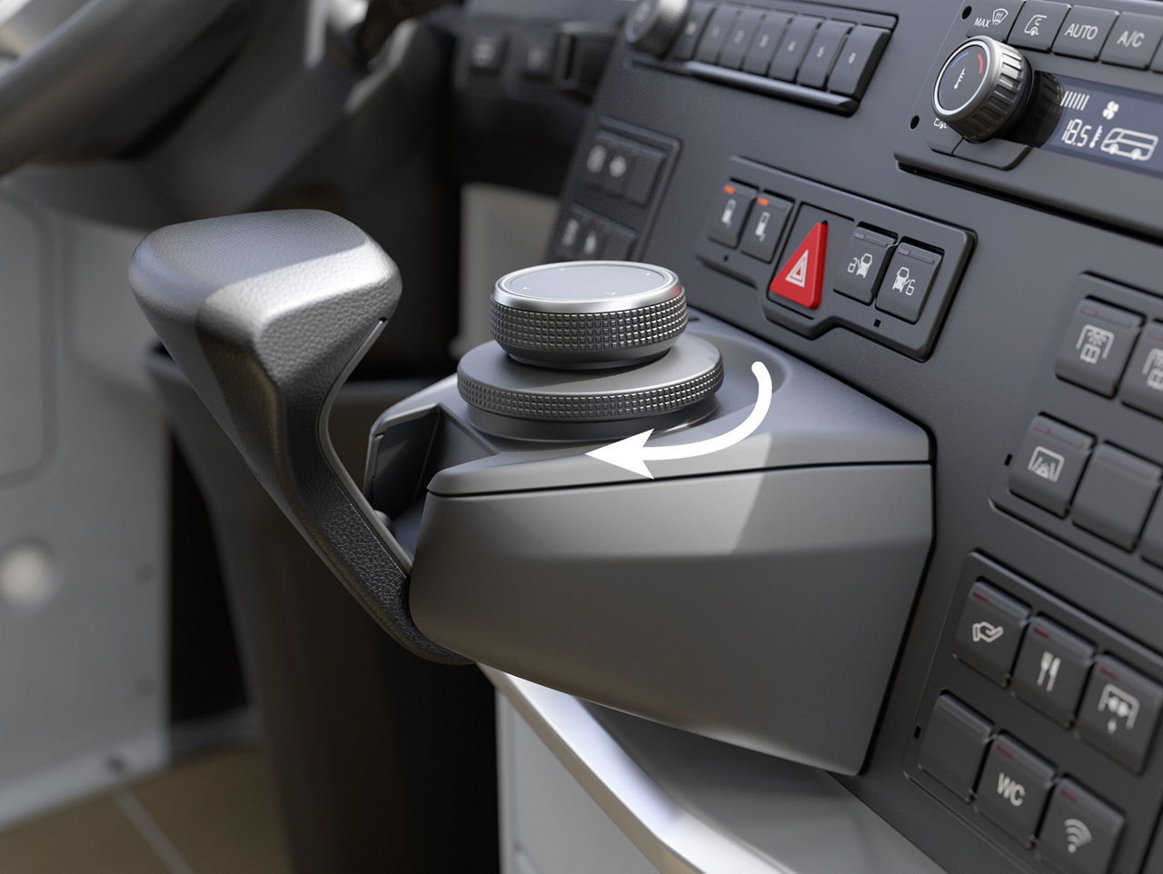 Der Busfahrer navigiert mit MAN SmartSelect im Multimediasystems durch Drehen des kleinen Drehrings