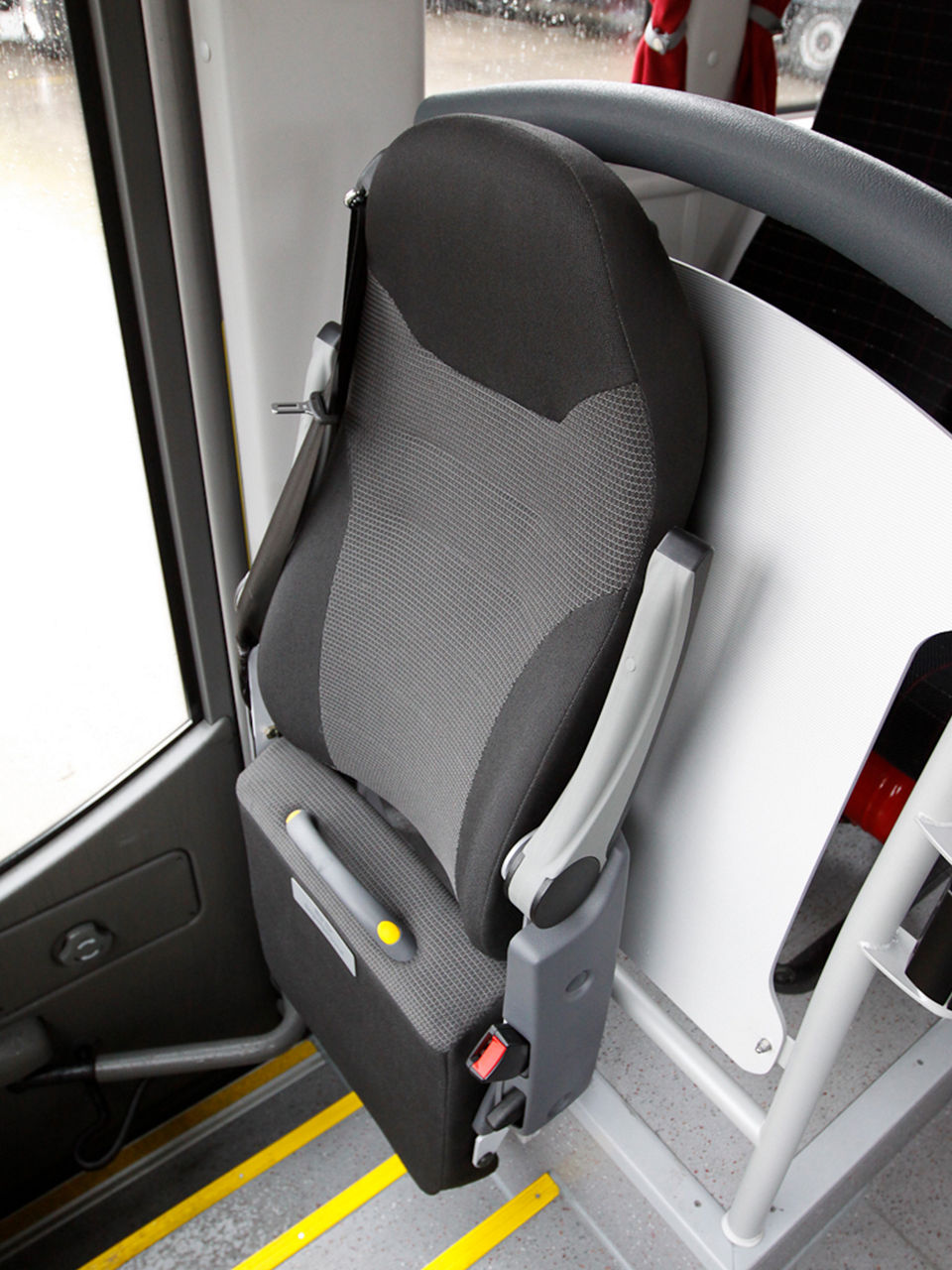 Fold-up seat for co-driver and courier