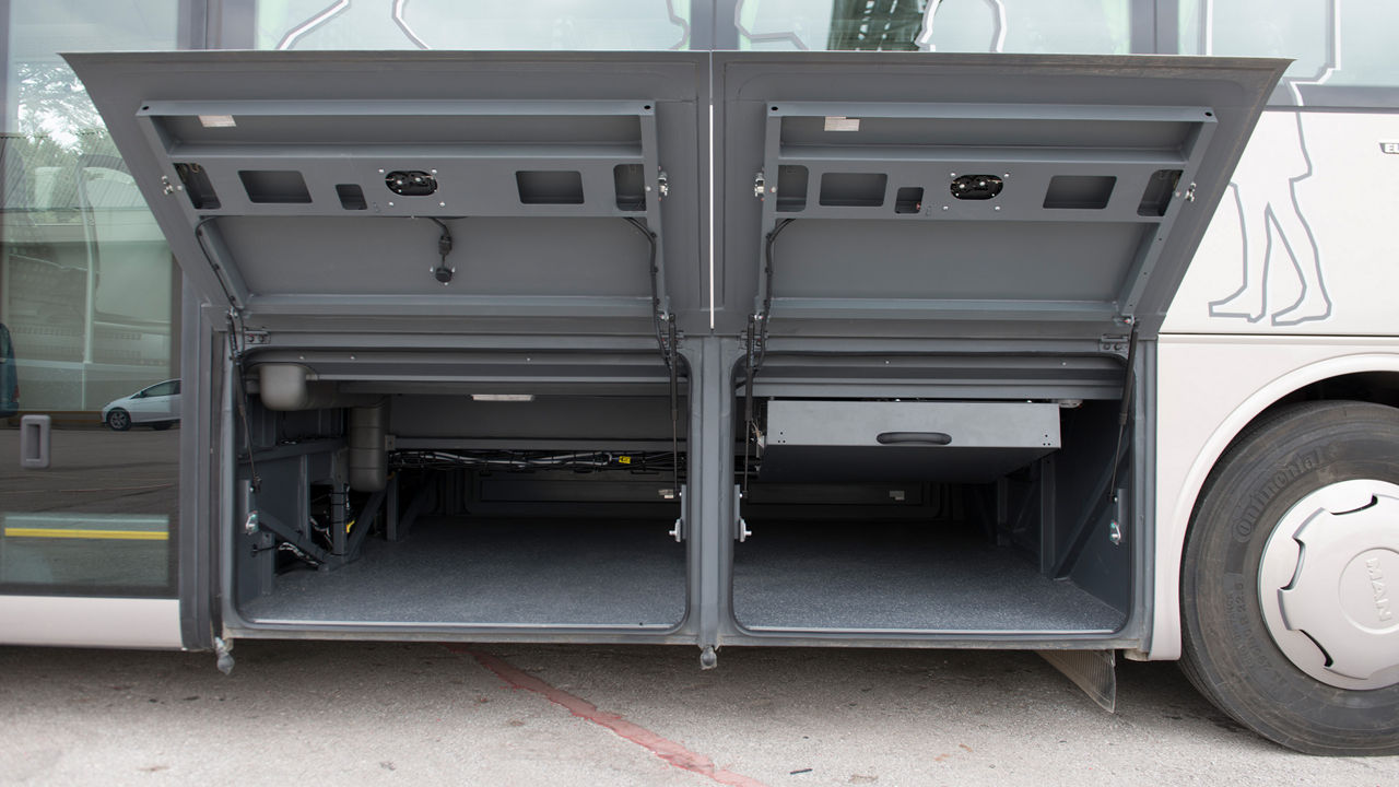 The luggage compartment of the MAN Lion’s Intercity with open flaps