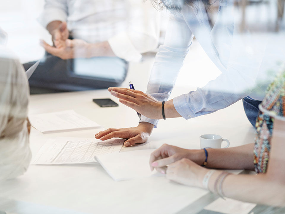 people discussing in an office