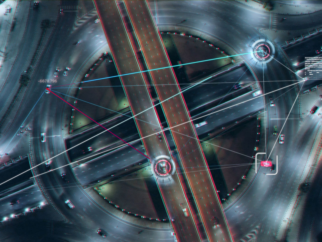 Ein Straßennetz aus der Vogelperspektive, das durch digitale Linien vernetzt ist