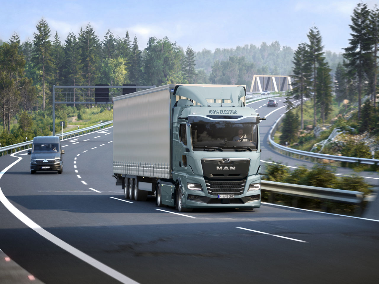 MAN eTGX on the motorway with forest in the background