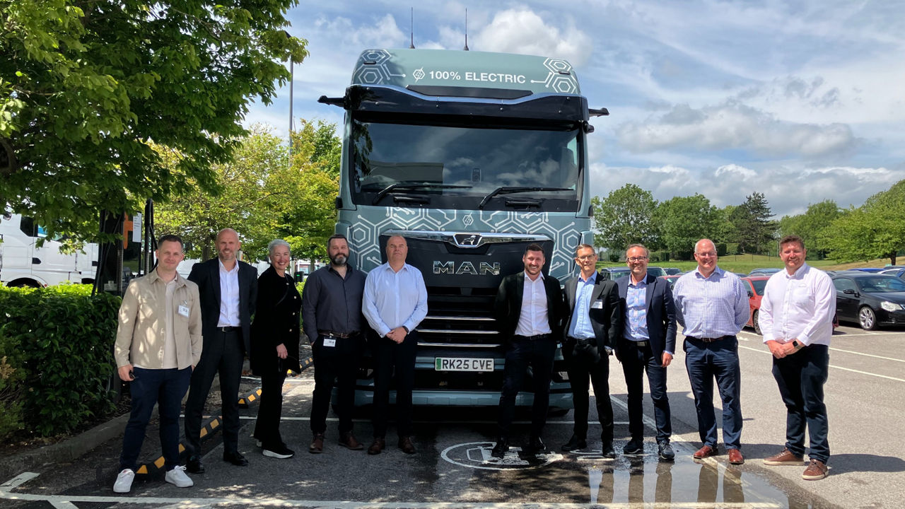 Team in front of a MAN TGX