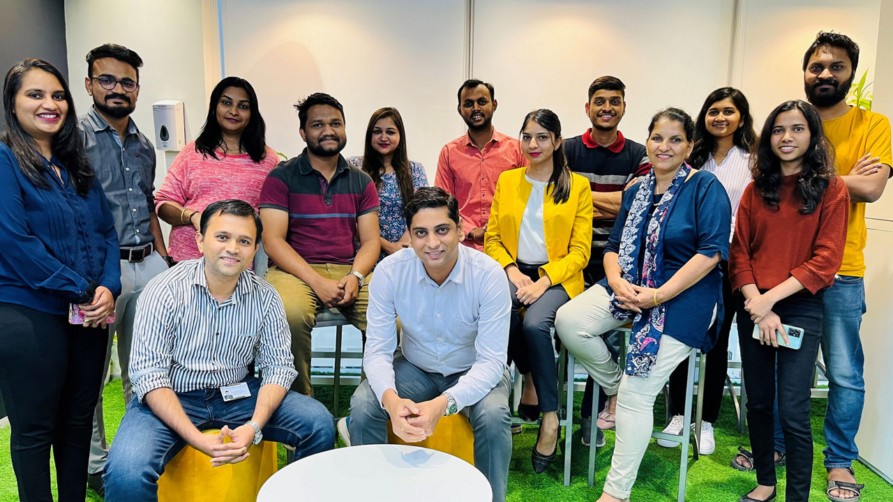 A group of women and men. 