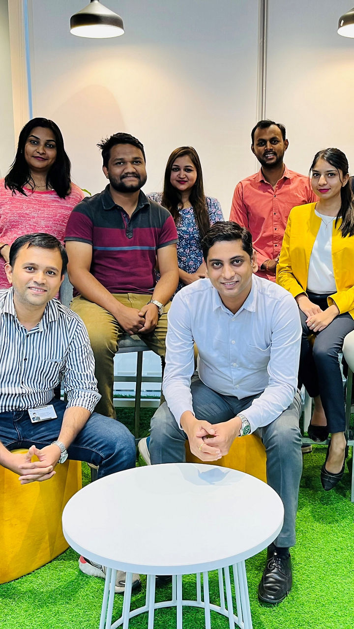 A group of women and men. 