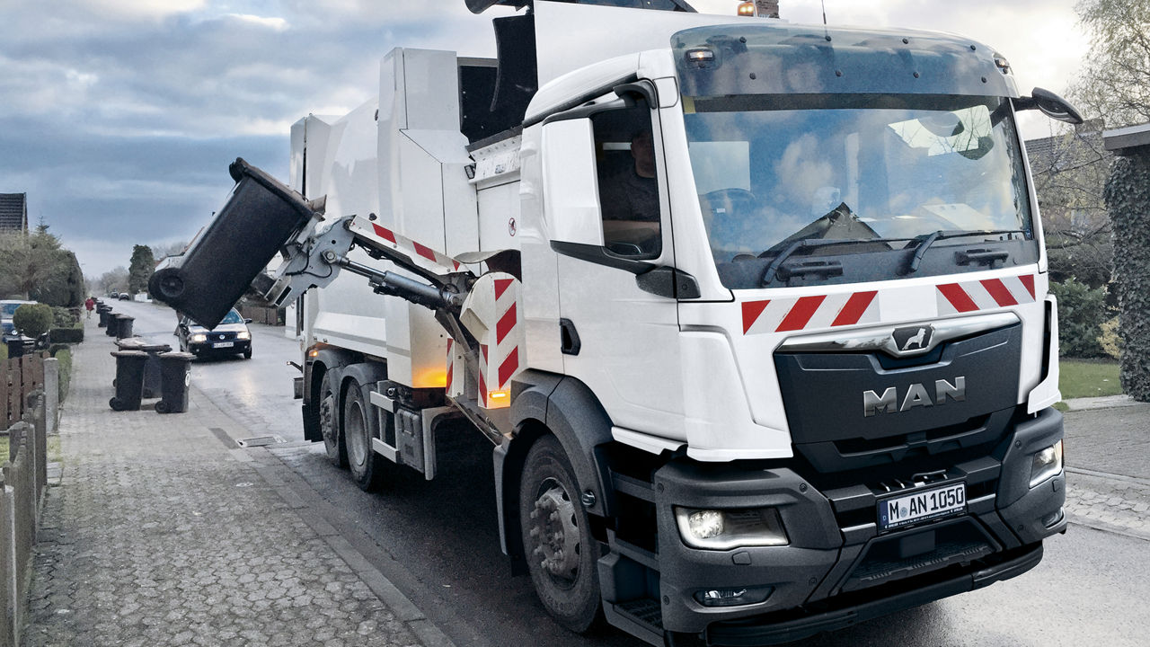 MAN refuse collector vehicle, side loader