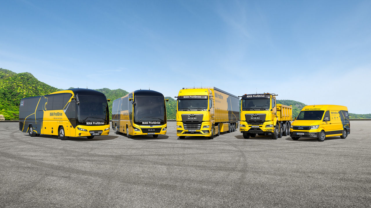 MAN ProfiDrive Fahrzeuge in Flottenaufstellung – Bus, Lkw, Transporter auf freier Fläche