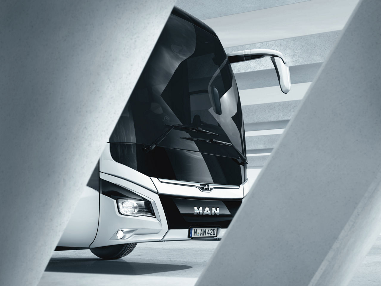 A MAN bus on a bridge.