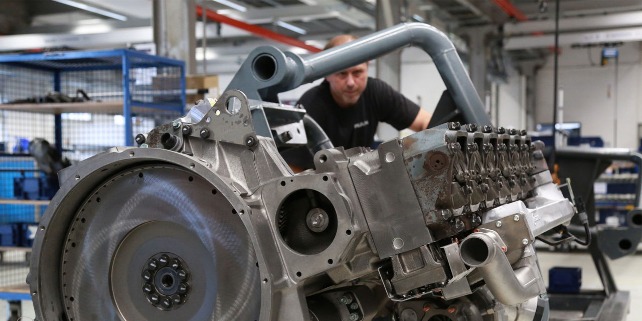 A engine for a construction machine in the assembly rack. 