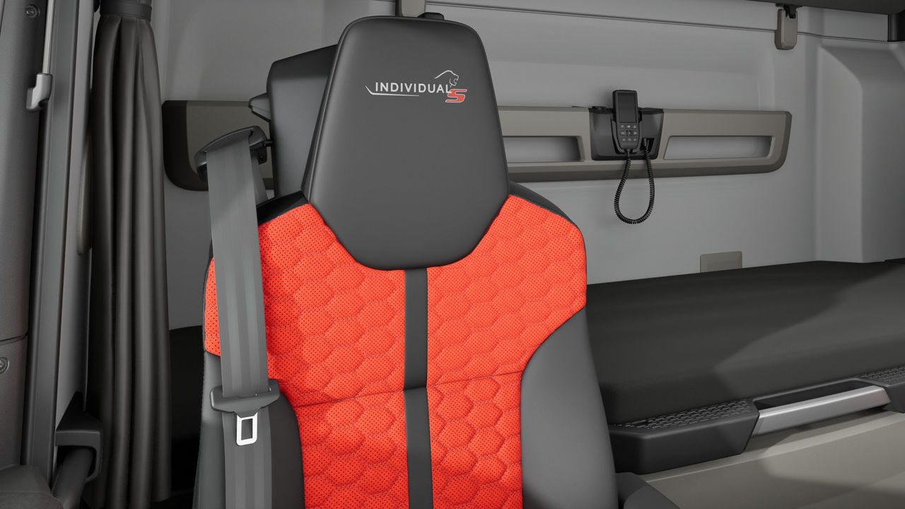 Passenger seat with premium cover.