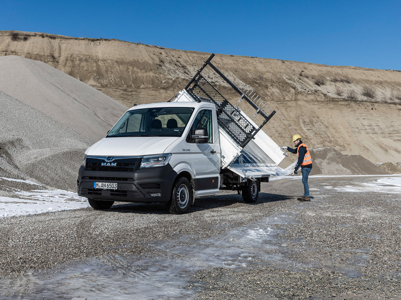 The resilient MEILLER three-way tipper TRIGENIUS for construction