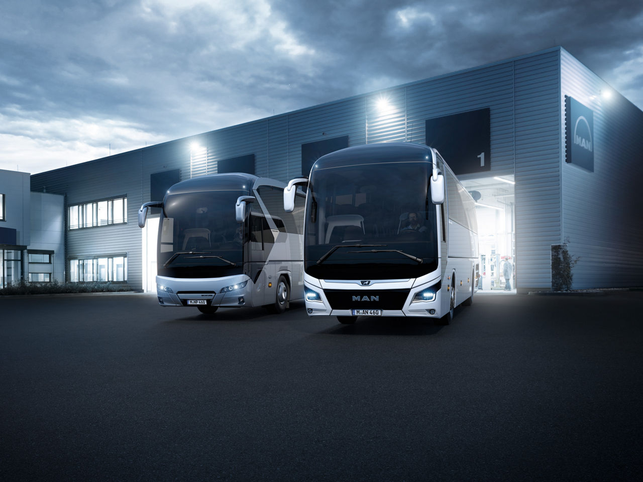 MAN buses in front of a service garage
